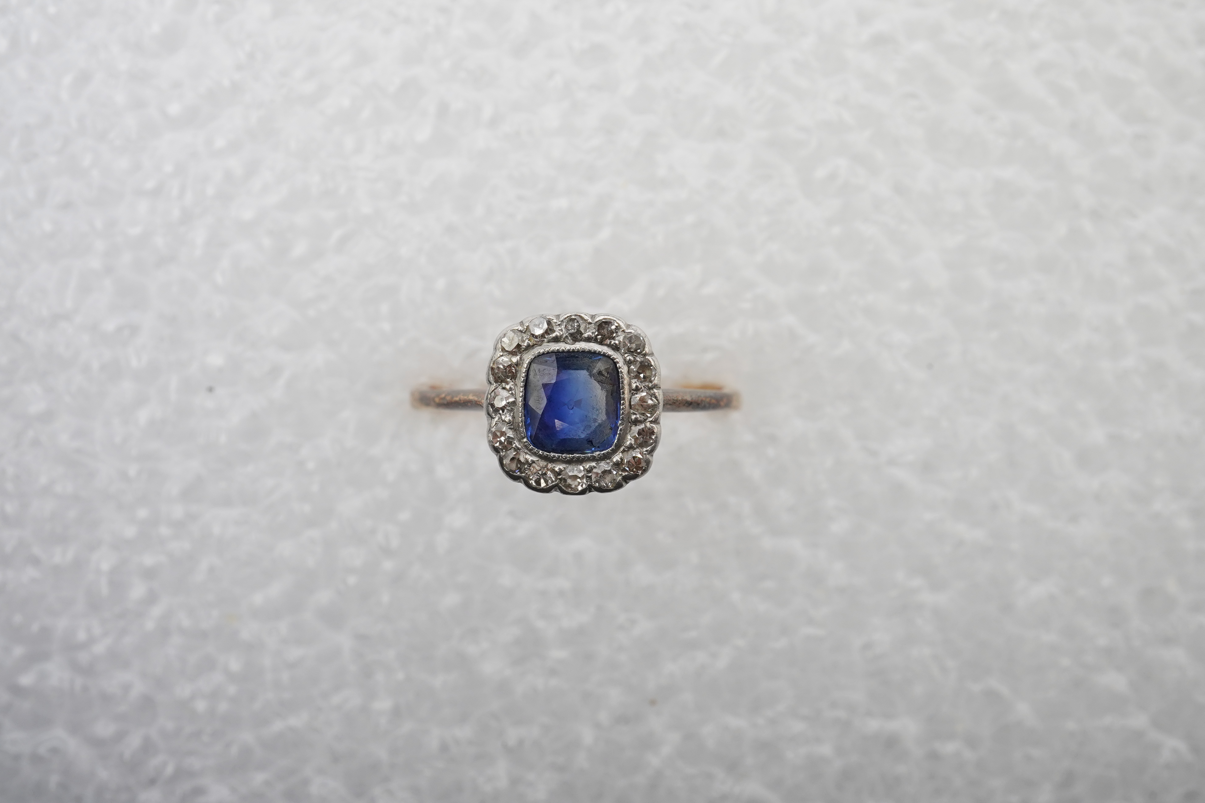 A sapphire and diamond cluster ring, early 20th century